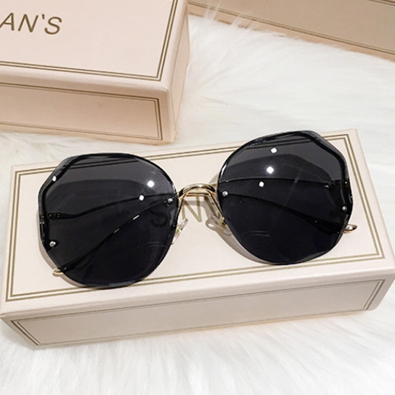 Luxury Round Gradient Sunglasses Women Metal Curved Temples Eyewear