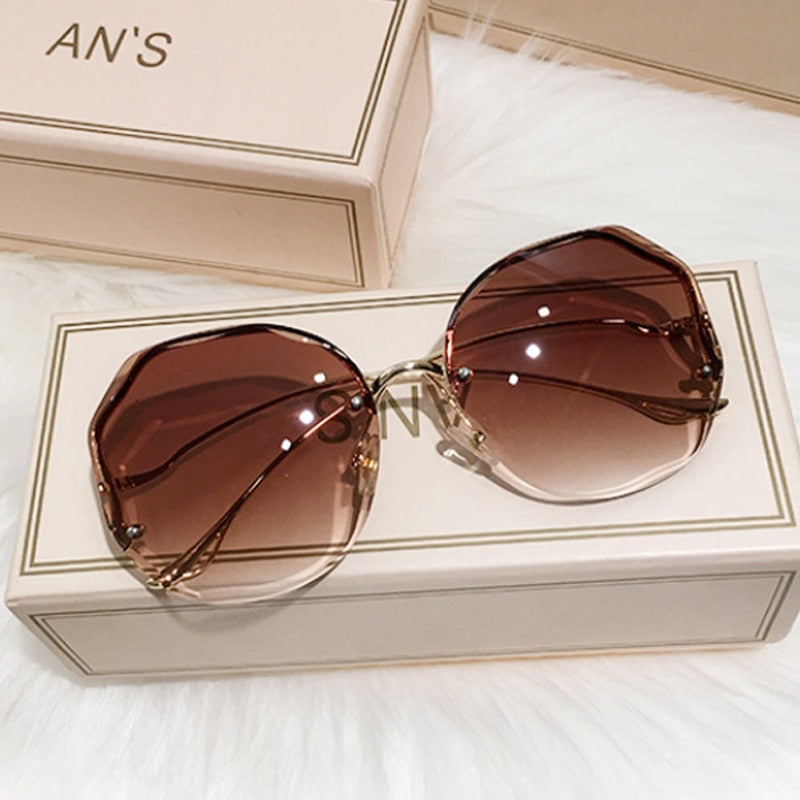 Luxury Round Gradient Sunglasses Women Metal Curved Temples Eyewear